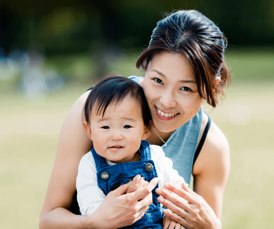 mother and child outside happy after postpartum depression